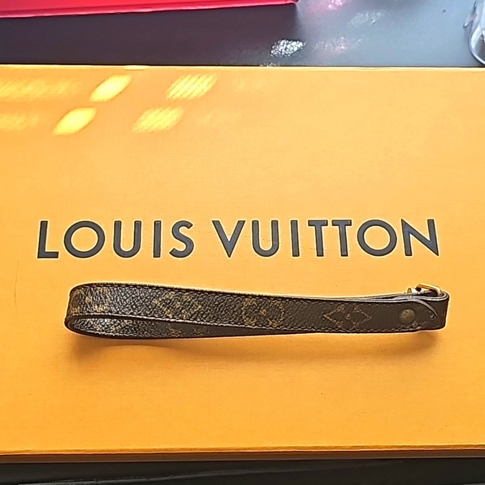 Authentic Louis vuitton Keychain/Wristlet strap. Excellent condition